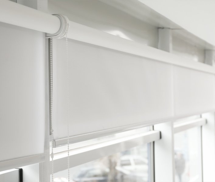 Roller blinds in a bright living room